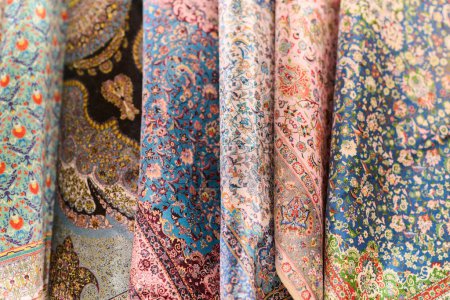 A kaleidoscope of traditional Muslim garments displayed at an Istanbul market reflects the rich cultural heritage of the city. 