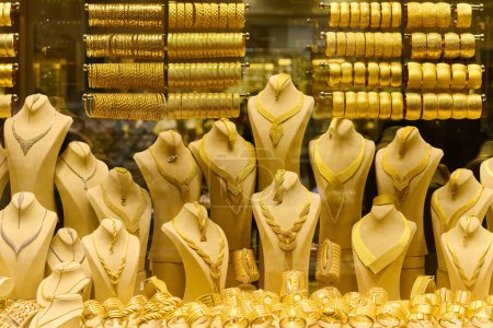 Golden Splendor, Exquisite handcrafted gold jewelry displayed in the bustling streets and traditional workshops of Istanbul. 