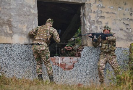 In a high stakes mission, a specialized military unit executes a tactical operation to secure a dangerous house where terrorists are believed to be hiding, showcasing precision and coordinated