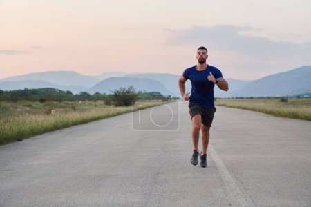 Photo for A highly motivated marathon runner displays unwavering determination as he trains relentlessly for his upcoming race, fueled by his burning desire to achieve his goals. - Royalty Free Image