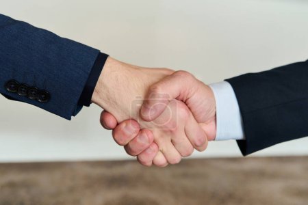 Photo for Businessmen making handshake with partner, greeting, dealing, merger and acquisition, business joint venture concept, for business, finance and investment background, teamwork and successful business. - Royalty Free Image