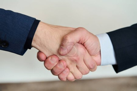 Photo for Businessmen making handshake with partner, greeting, dealing, merger and acquisition, business joint venture concept, for business, finance and investment background, teamwork and successful business. - Royalty Free Image
