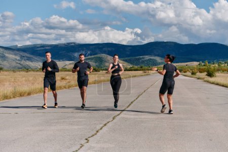 A professional athletic team as they train rigorously, running towards peak performance in preparation for an upcoming marathon. 