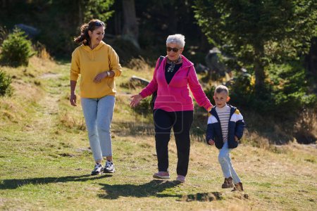 A family shares delightful moments with their friends amid the stunning landscapes of mountains, lakes, and winding paths, promoting a healthy lifestyle and the joy of familial bonds in the embrace of