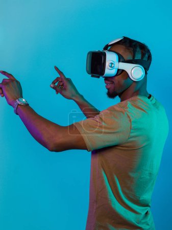 Immersed in a digital realm, an African American man navigates the virtual landscape with a VR goggles, using tactile gestures to interact with virtual objects, showcasing a harmonious blend of