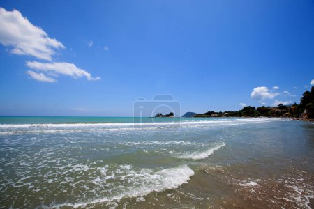 Photo for Beach of Zakynthos island. Sunny spring seascape of the Ionian Sea, Greece, Europe. Beauty of nature concept background. - Royalty Free Image