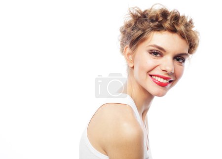 Photo for Portrait of a young smiling blonde woman with a braids on white background - Royalty Free Image