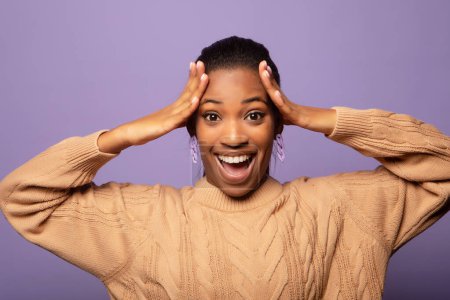 Photo for Surprised amazed beautiful afro woman with wide open mouth looking at camera, smiling. - Royalty Free Image