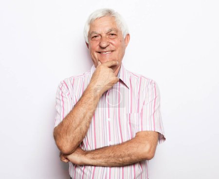 Photo for Lifestyle, emotion and old people concept: Close up portrait of happy senior man over white background - Royalty Free Image