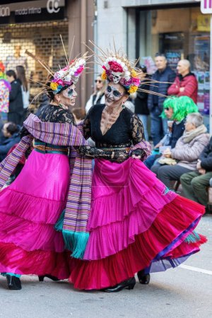 Foto de Palamos, Spain - february 19, 2023, Traditional carnival parade in a small town Palamos, in Catalonia, in Spain . - Imagen libre de derechos