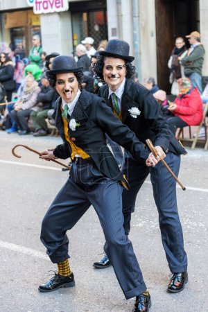 Foto de Palamos, Spain - february 19, 2023, Traditional carnival parade in a small town Palamos, in Catalonia, in Spain . - Imagen libre de derechos