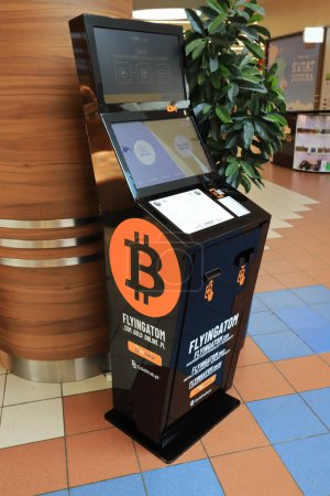 Photo for Gdansk, Poland, March 21, 2023 Online currency Bitcoin vending machine cryptocurrency dispenser in shopping centre mall entrance, Europe - Royalty Free Image