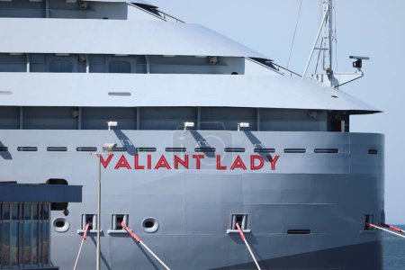 Foto de IJmuiden, The Netherlands - April 20th, 2022:  Valiant Lady cruise ship, operated by Virgin Voyages. Detail of the bow with name - Imagen libre de derechos
