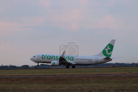 Photo for Amsterdam the Netherlands - July 26th 2018: PH-HXM Transavia Boeing 737-800 takeoff from Polderbaan runway, Amsterdam Airport Schiphol - Royalty Free Image