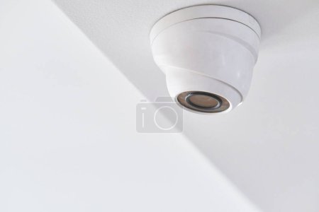 Photo for Cctv on white ceiling in modern building - Royalty Free Image