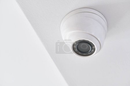 Photo for Cctv on white ceiling in modern building - Royalty Free Image