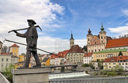 Monument on bridge in old town of Steyr, Austria
