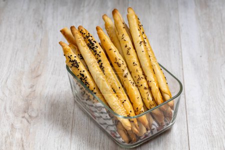 Photo for Homemade bread sticks with sesame seeds. - Royalty Free Image