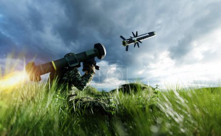 Soldier firing anti-tank missile at war from his lightweight portable weapon system