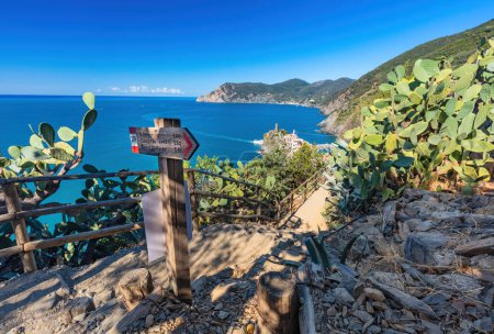 Sign post on trail path near Vernazza in Cinque Terre, Italy. Sunny summer day