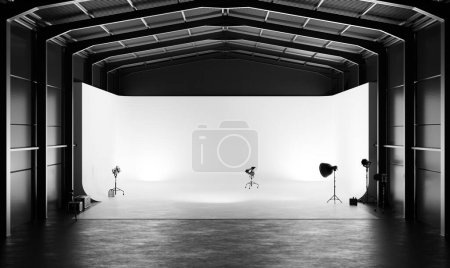 Professional photography studio with lighting equipment and white cyclorama