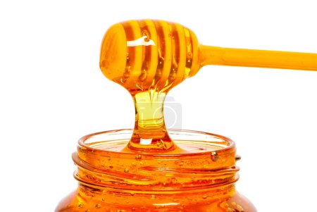 Photo for Jar with honey on white background - Royalty Free Image