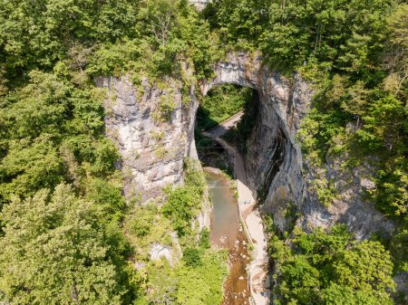 Photo for Natural bridge in the Virginia state reserve. Natural Bridge State Park. A work of nature that attracts tourists. Drone view. - Royalty Free Image
