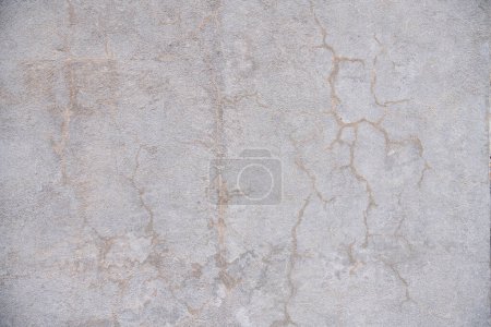Shabby Old grungy cement wall as background or texture, gray rusty vintage