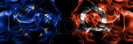 Téléchargez les photos : Flags of EU, European Union vs Japan, Japanese, Fukushima Prefecture. Smoke flag placed side by side on black background. - en image libre de droit