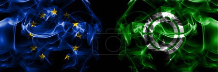 Photo for Flags of EU, European Union vs Japan, Japanese, Takinoue, Hokkaido, Okhotsk, Subprefecture. Smoke flag placed side by side on black background. - Royalty Free Image