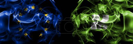Téléchargez les photos : Flags of EU, European Union vs Japan, Japanese, Tochigi Prefecture. Smoke flag placed side by side on black background. - en image libre de droit