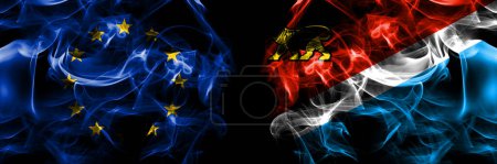 Téléchargez les photos : Flags of EU, European Union vs Russia, Russian, Primorsky Krai. Smoke flag placed side by side on black background. - en image libre de droit