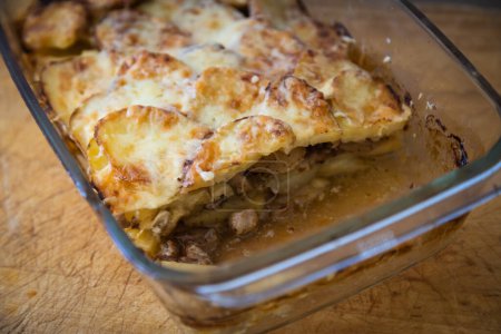 Photo for Roasted potato moussaka with spices and minced meat ready for serving - Royalty Free Image