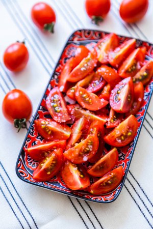 Photo for Freash and raw tomato salad with various other ingredients - Royalty Free Image