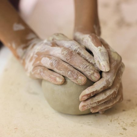 Photo for Female pottery artist preparing clay for molding. Close Up view of woman hands with clay. Creative handmade craft. - Royalty Free Image