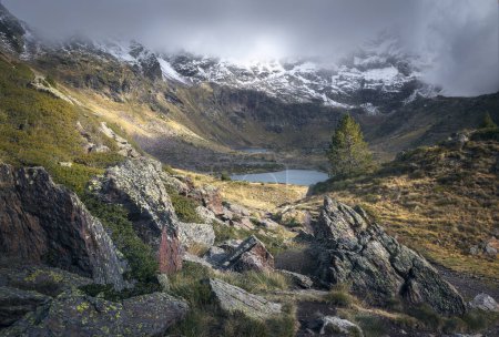Mystical Serenity: Tristaina Lakes Embraced by Mist in Andorra