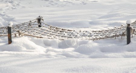 Photo for Rope net on the ground in the snow - Royalty Free Image