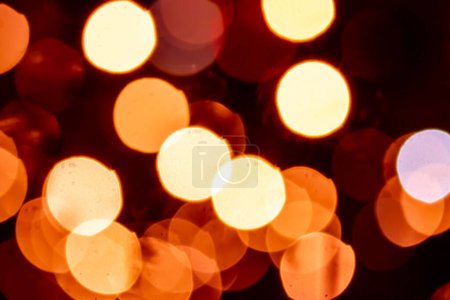 Photo for Bokeh abstraction, round bright multi-colored lights out of focus, holiday background. - Royalty Free Image