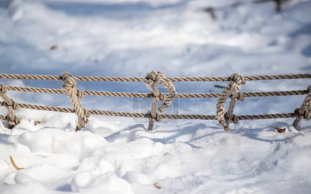 Photo for Rope net on the ground in the snow - Royalty Free Image