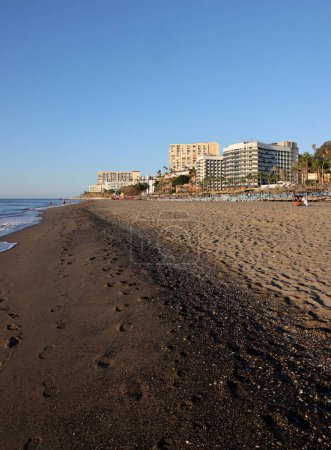 Photo for Torremolinos, Spain - September 12, 2023: View of Bajondillo Beach and hotels in Torremolinos at sunrise. Costa del Sol, Spain. - Royalty Free Image