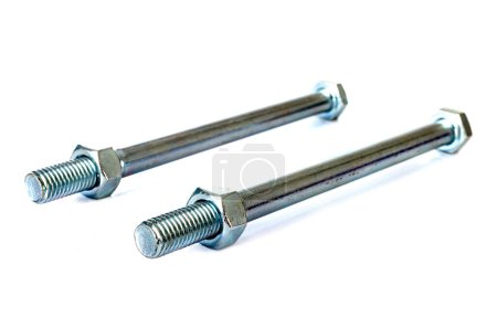Photo for Long nut and bolt in front of white background - Royalty Free Image