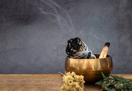Photo for White sage incense and singing bowl in front of white background - Royalty Free Image