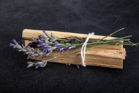 palo santo  in front of wood background