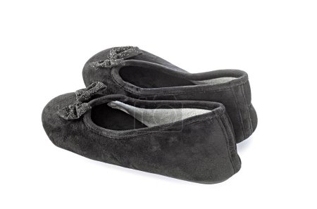 Photo for Black velvet slippers in front of white background - Royalty Free Image