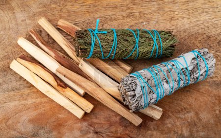 Photo for White sage incense and palo santo in front of white background - Royalty Free Image