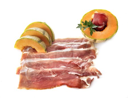 Photo for Slice of cured ham serano and melon in front of white background - Royalty Free Image