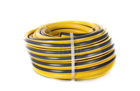 Photo for Garden hose in front of white background - Royalty Free Image