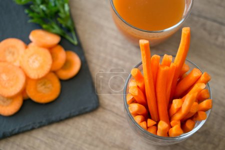 Photo for Fresh raw vegetable juice. Carrot juic - Royalty Free Image