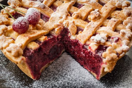 Photo for Homemade cherry pie with slice remove - Royalty Free Image