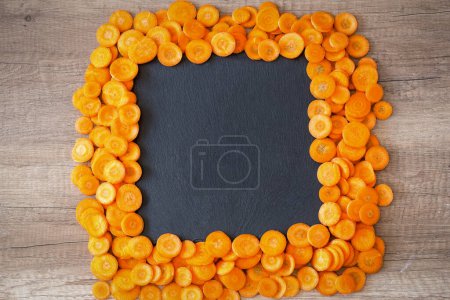 Photo for Food background of raw carrot slice - Royalty Free Image